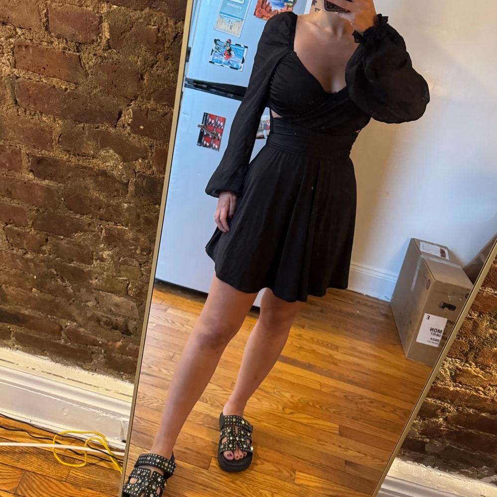 Lucy in the skit fit and flared black dress
